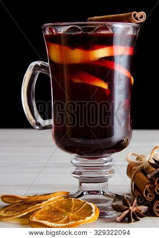 The mulled wine glintwine served in glasses for christmas table