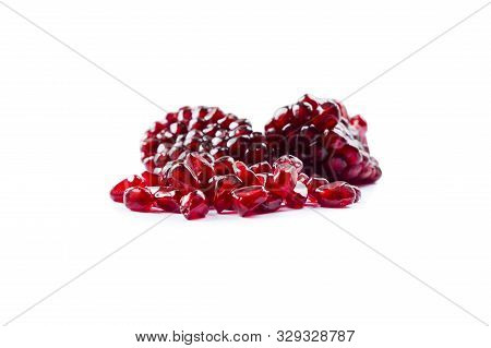 Pomegranate Isolated On White Background. Sweet And Juicy Garnet With Copy Space For Text. Garnets I