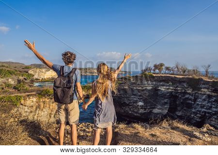Man And Woman In Honeymoon Near Broken Beach In Nusa Penida, Indonesia Angels Billabong Beach. Popul