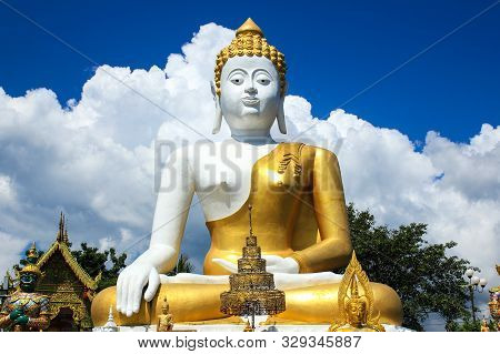Big Buddha In Wat Phara That Doi Kham Temple ,chiang Mai ,thailand.
