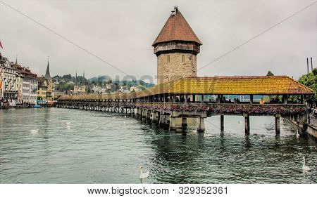 Wooden Bridge Pasarels Over The Lake Of Lucerne