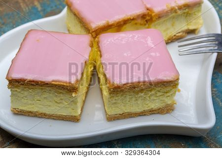 Tompoes Or Tompouce, Iconic Pastry In Netherlands And Belgium Made From Puff Dough, Icing, Cream