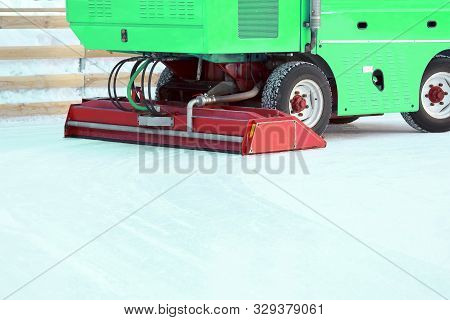 Special Machine Ice Harvester Cleans The Ice Rink. Winter Specialized Transport