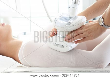 Vacuum Massage Using The Head. Slimming Treatment, Body Firming On Arms And Hands