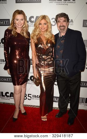 LOS ANGELES - OCT 19:  Michelle Berk, Donna D'Errico, Michael Berk at the Last Chance for AnimalsÃ¢â¬â¢ 35th Anniversary Gala at the Beverly Hilton Hotel on October 19, 2019 in Beverly Hills, CA