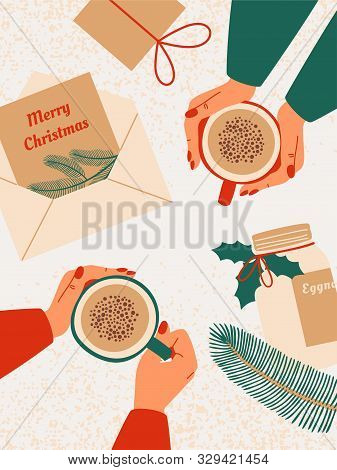 Top View Of Human Hands Hold Mug With Eggnog Surrounded By Gifts, Greeting Cards With Wishes Merry C
