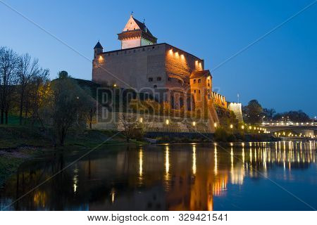 The Ancient Castle Of Herman In October Twilight. Narva, Estonia