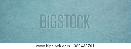 background and texture of slate blue Korean hanji paper handmade from inner bark of the mulberry tree, panoramic banner
