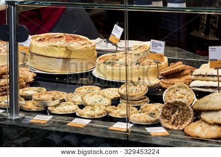 Munich, Germany - November 23, 2018 :counters And Showcases Of Butcher Shops At The Viktualienmarkt 