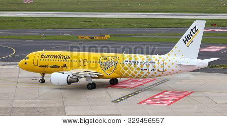Airplane Taxi In Dusseldorf Airport