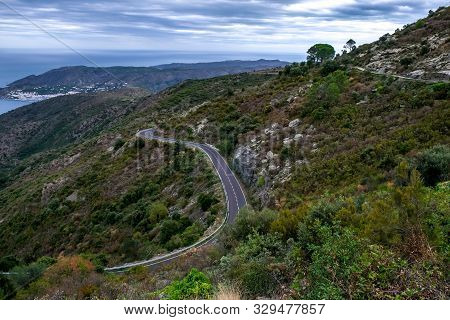 Amazing Mountain Road In Catalunya, Spain. Serpentine Mountain Route In Europe On Cloudy Sky Backgro