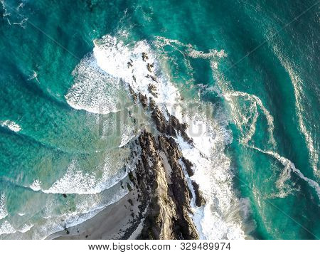 Beautiful Birds Eye View Of Waves, Cliffs And Turquoise Ocean In Byron Bay, Australias Most Eastern 