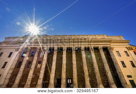Temple Of Hadrian Sun Rays Columns Colonnade Now Stock Exchange Rome Italy. Temple Built 145 Ad.