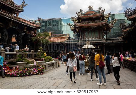 Taipei, Taiwan - October 20th, 2019: famous attraction of Lungshan temple at Taipei, Taiwan