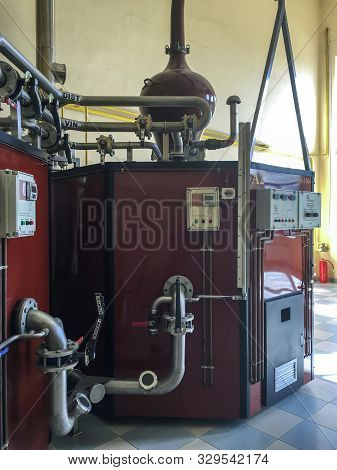 Distillation Apparatus Used To Distill Alcohol And Moonshine In A Winery.