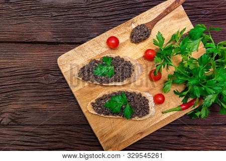 Fresh Tasty Bruschetta With Truffle Sauce, Chili, Parsley And Tomates. Top View