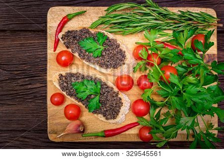 Fresh Tasty Bruschetta With Truffle Sauce, Chili, Parsley And Tomates. Top View