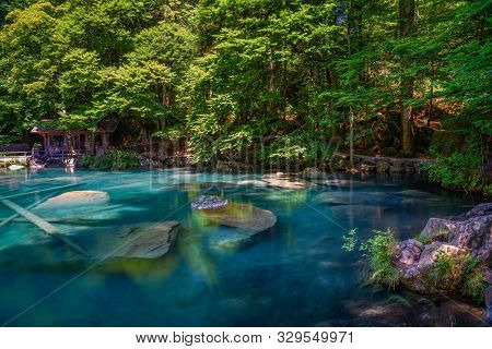 Mountain Lake Blausee Located In The Kander Valley Above Kandergrund In The Jungfrau Region. Long Ex