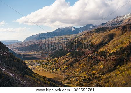 Aerial View Of Telluride, Colorado In Autumn With Surrounding San Juan Mountains. Telluride Is A His