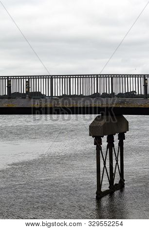 Wales - The Royal Town Of Caernarfon. Picture Of Detail Of The Swing Bridge Opposite The Historic Ca