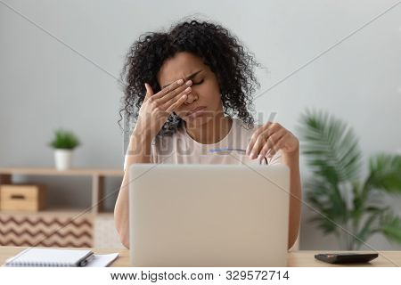 Unhealthy Black Girl Rub Eyes Suffering From Migraine