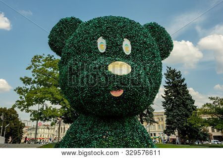 Kharkiv, Ukraine, August 2019 Big Teddy Bear Topiary Figure In City Park. Outdoor Fun Decoration Fro
