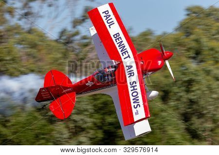 Tyabb, Australia - March 9, 2014: Pitts S-1s Aerobatic Biplane Vh-ipb Flying At Low Level During An 