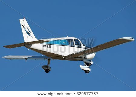 Tyabb, Australia - March 9, 2014: Piper Cherokee (pa-28-140) Single Eying Light Aircraft Vh-eti Flyi