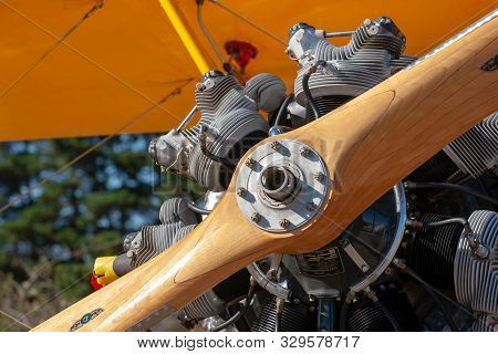 Tyabb, Australia - March 9, 2014: Vintage Biplane With A 7 Cylinder Radial Engine With A Wooden Prop