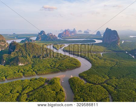 Aerial Top View Of Samet Nangshe And Tropical Green Forest Trees At Sunset With Andaman Sea In Phang