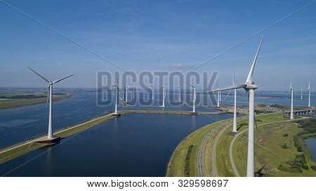 Wind Turbine From Aerial View, Drone View At Windpark Krammersluizen A Windmill Farm In The Lake Gre