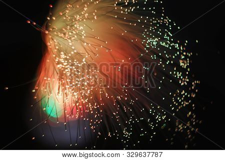 Colored Whims Of A Panicle Of A Lamp From A Bundle Of Optical Fiber Threads.