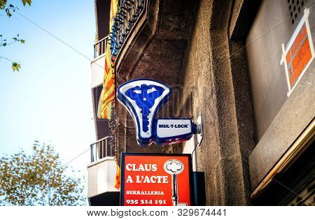Barcelona, Spain - Nov 14 2017: Key Repair Making Center With Mul-t-lock Logotype Insignia And Claus