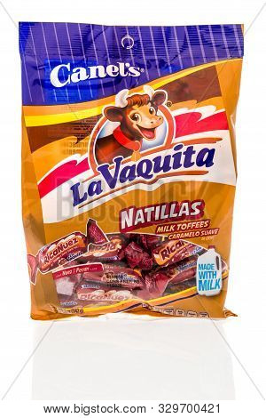 Winneconne, Wi - 10 October 2019: A Package Of Canels La Vaquita Natillas  Candy On An Isolated Back