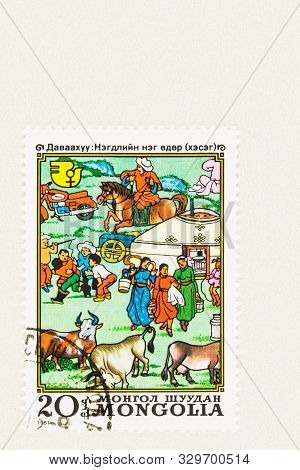 Seattle Washington - October 4, 2019: Mongolia Postage Stamp Featuring Traditional Life In Rural  Co