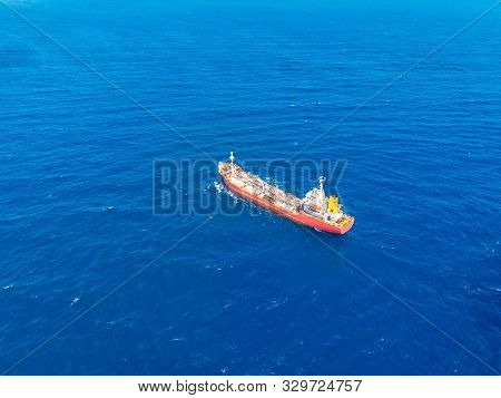 Oil Chemical Tanker Sails Blue Sea. Aerial Top View