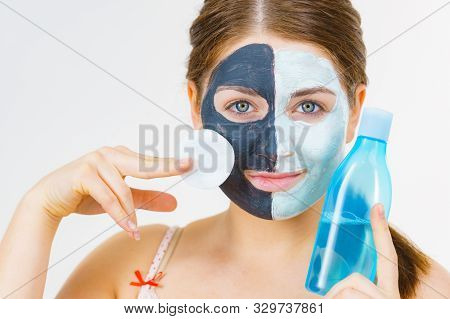 Girl Remove Black White Mud Mask From Face