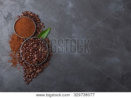 Fresh Raw Organic Coffee Beans With Ground Powder And Coffee Trea Leaf On Black. Space For Text