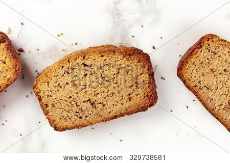 A Close-up Of A Chia Seeds Cake, Shot From Above On A Marble Cutting Board, Healthy Vegan Baking