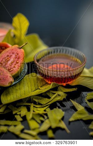 Skin Whitening Remedy/treatment On The Black Shiny Surface Consisting Of Guava Pulp And Honey. Also