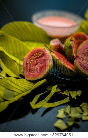 Skin Whitening Remedy/treatment On The Black Shiny Surface Consisting Of Guava Pulp And Honey. Also