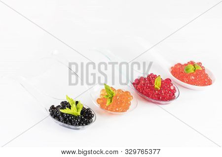 Molecular Cuisine Caviar Elements Shot Closeup Of A Plastic Buffet Table Spoon.