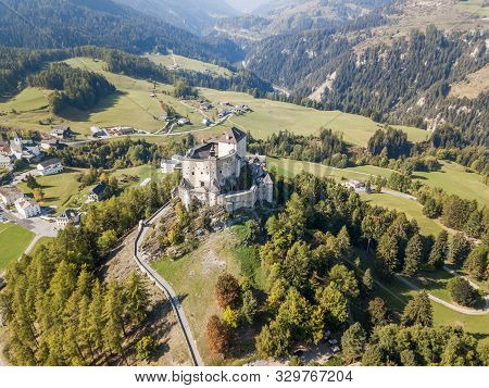 Aerial View Of Castle Tarasp (built In The 11th Century) In Swiss Alps, Canton Grisons Or Graubuendo