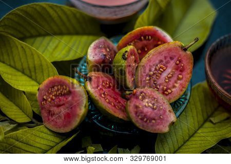 Skin Whitening Remedy/treatment On The Black Shiny Surface Consisting Of Guava Pulp And Honey. Also 