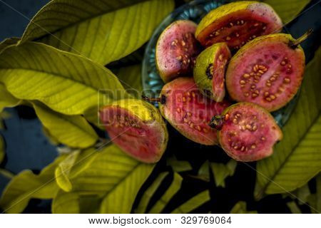 Skin Whitening Remedy/treatment On The Black Shiny Surface Consisting Of Guava Pulp And Honey. Also 
