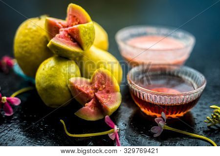 Skin Whitening Remedy/treatment On The Black Shiny Surface Consisting Of Guava Pulp And Honey. Also 