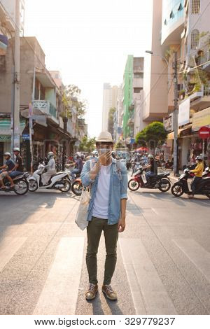 Young Asian Traveling Backpacker In Cho Lon In Chinatown, Saigon