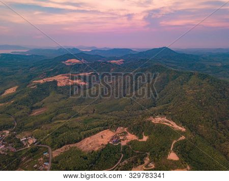 Aerial Top View Of Samet Nangshe, Mountain Valley Hills, And Tropical Green Forest Trees At Sunset W