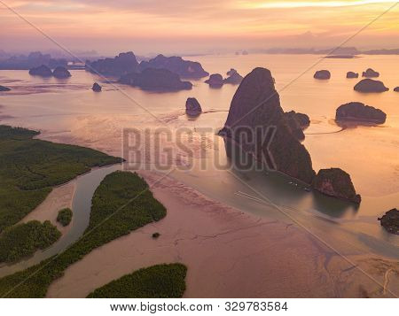 Aerial Top View Of Samet Nangshe, Mountain Valley Hills, And Tropical Green Forest Trees At Sunset W