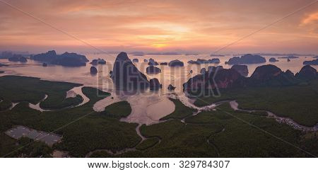Aerial Top View Of Samet Nangshe, Mountain Valley Hills, And Tropical Green Forest Trees At Sunset W